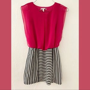 Sleeveless pink top and striped skirt dress